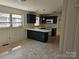 Well-lit kitchen boasts a modern design with updated appliances and plenty of countertop space at 1873 Rocky River Rd, Lancaster, SC 29720
