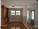Spacious living room features hardwood floors, natural light, and a built-in bookcase at 1873 Rocky River Rd, Lancaster, SC 29720