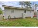 View of exterior siding showing a utility hook up on the home's siding at 208 Tomberlin Rd, Mount Holly, NC 28120