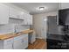Updated kitchen with butcher block countertops and stainless steel appliances at 208 Tomberlin Rd, Mount Holly, NC 28120