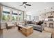 Inviting living room with hardwood floors, a comfortable sofa, and ample natural light from large windows at 209 Halemarg Dr, Belmont, NC 28012