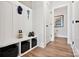 Well-organized mud room with storage cubbies, a coat rack, and easy access to the adjacent bathroom at 209 Halemarg Dr, Belmont, NC 28012