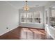 Bedroom featuring hardwood floors, bright windows, and neutral paint at 225 Lincoln St, Charlotte, NC 28203