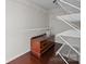 Walk-in closet featuring wire shelving and a built-in dresser at 225 Lincoln St, Charlotte, NC 28203