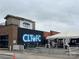 Exterior of building with CLT FC advertisement and outdoor tables with a tent at 225 Lincoln St, Charlotte, NC 28203