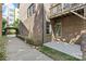 This is a cozy brick home featuring a private patio and balcony at 225 Lincoln St, Charlotte, NC 28203