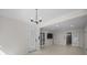 Living room with tile floors, French doors, and recessed lighting at 225 Lincoln St, Charlotte, NC 28203