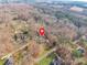 Aerial view of property's location on a tree-lined street in a quiet neighborhood at 406 Forest Dr, York, SC 29745