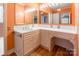 Bathroom featuring an extended vanity with a sink, mirrors, and decorative lighting at 406 Forest Dr, York, SC 29745