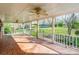 Spacious covered patio with brick flooring, ceiling fans, and a view of the fenced backyard at 406 Forest Dr, York, SC 29745