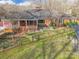 Charming brick home featuring a covered porch, fenced yard, and carport, providing both comfort and functionality at 406 Forest Dr, York, SC 29745