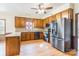 Charming kitchen features wood cabinets, stainless appliances, and hardwood floors at 406 Forest Dr, York, SC 29745