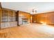 Inviting living room offers a fireplace, built-in shelving, and hardwood floors at 406 Forest Dr, York, SC 29745