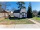 A sturdy outbuilding with double doors offers extra storage and potential workshop space at 601 Carole Ln, Charlotte, NC 28214