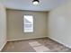 Neutral bedroom featuring carpet, window, and neutral paint at 620 Weyburn Nw Dr, Concord, NC 28027
