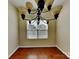 Cozy dining area featuring hardwood floors, a chandelier, and natural light at 620 Weyburn Nw Dr, Concord, NC 28027