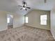 Large main bedroom with vaulted ceiling, neutral carpet, and natural light at 620 Weyburn Nw Dr, Concord, NC 28027