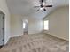 Bright main bedroom with vaulted ceiling and an ensuite bathroom at 620 Weyburn Nw Dr, Concord, NC 28027