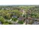 Aerial view of neighborhood featuring houses with well-manicured lawns and mature trees at 6319 High Creek Ct, Charlotte, NC 28277