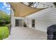 Outdoor deck with shade covering, perfect for relaxing and entertaining at 6319 High Creek Ct, Charlotte, NC 28277
