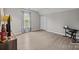 Spacious bedroom features wood floors, a window, and plenty of room at 6319 High Creek Ct, Charlotte, NC 28277