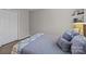 Bedroom featuring neutral walls, wood floors, and a built-in shelf at 6319 High Creek Ct, Charlotte, NC 28277