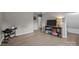 Inviting living room with wood floors and built-in shelving for decor at 6319 High Creek Ct, Charlotte, NC 28277