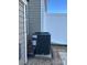 Image of the outdoor unit of the property's air conditioning system on a concrete slab next to the house at 6410 Hasley Woods Dr, Huntersville, NC 28078