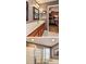 Bathroom featuring double sinks and a walk-in shower with glass doors plus view to Main Bedroom at 6410 Hasley Woods Dr, Huntersville, NC 28078