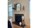 Elegant fireplace with stylish decor and accents, creating a cozy ambiance at 6410 Hasley Woods Dr, Huntersville, NC 28078