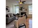 Bright living room with a decorative fireplace, modern decor, and lots of natural light at 6410 Hasley Woods Dr, Huntersville, NC 28078