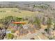 An aerial view captures this homes natural beauty with surrounding trees and an expansive lawn at 6688 Pine Forest Dr, York, SC 29745