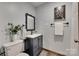 Charming bathroom with vanity, decorative mirror, and soft blue walls at 6688 Pine Forest Dr, York, SC 29745