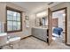 This bathroom has a double vanity and a window providing ample natural light at 6688 Pine Forest Dr, York, SC 29745