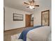 This bedroom has a ceiling fan and a view into an adjoining bathroom at 6688 Pine Forest Dr, York, SC 29745