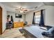 Bedroom with a bed, tv, ceiling fan, and a window at 6688 Pine Forest Dr, York, SC 29745