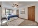 Cozy bedroom with a plush bed, soft lighting, and carpeted floors at 6688 Pine Forest Dr, York, SC 29745