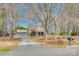 Charming home with mature trees, long driveway, and a detached garage, blending comfort with natural beauty at 6688 Pine Forest Dr, York, SC 29745