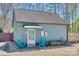 Detached garage with private entrance, stylish lighting, and charming chairs for relaxing outdoors at 6688 Pine Forest Dr, York, SC 29745