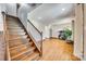 Spacious living area with hardwood floors and a staircase, perfect for entertaining or relaxing at 6688 Pine Forest Dr, York, SC 29745