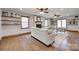 Bright and airy living room with fireplace, hardwood floors, and comfortable seating at 6688 Pine Forest Dr, York, SC 29745