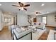 Spacious living room featuring hardwood floors, comfortable seating, and an open layout at 6688 Pine Forest Dr, York, SC 29745