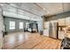 Open-concept studio with hardwood floors, modern appliances, and a unique bed with draped canopy at 6688 Pine Forest Dr, York, SC 29745