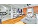 Cozy living room with hardwood floors and ladder shelf decor at 6956 Oakstone Pl, Charlotte, NC 28210
