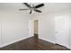 Neutral bedroom features dark wood floors and ample closet space at 7124 Brynhurst Dr, Charlotte, NC 28210