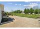 Spacious backyard features lush greenery along the fence line and a manicured lawn at 8310 Sandstone Crest Ln, Indian Land, SC 29707