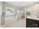 Luxurious bathroom featuring a soaking tub, and glass shower at 8310 Sandstone Crest Ln, Indian Land, SC 29707