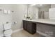 Neutral bathroom featuring a long countertop and integrated sink at 8310 Sandstone Crest Ln, Indian Land, SC 29707