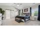 Bright main bedroom with high ceilings, large windows and ensuite bathroom at 8310 Sandstone Crest Ln, Indian Land, SC 29707