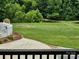 Scenic backyard featuring lush greenery, a tranquil pond, and a glimpse of wildlife, enhancing its natural appeal at 1030 Hurley School Rd, Salisbury, NC 28147